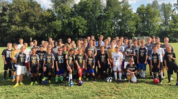 Spalding Men's Soccer Participates In Community Soccer Clinic